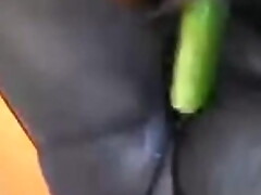 Ebony wife and cucumber